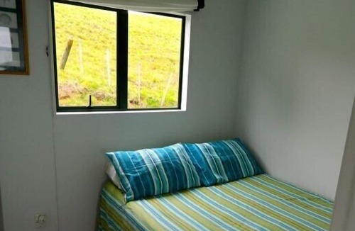 Opito Bay Cottage | Bach With a View - Opito Bay Bach