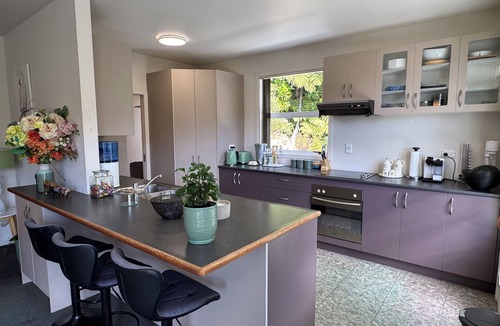 Paihia House | Backing on native bush yet 650m to the beach. Stunning spacious family home.