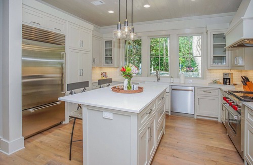 Grayton Beach House | Backyard Creek And Outdoor Kitchen- Jubilee Retreat By Royal Destinations