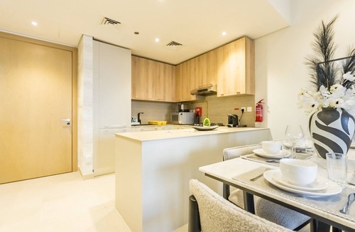 Al Barsha Apartment | Balcony-Facing Pool 2BR w/Asst Room, Minutes Walk to Park and Miracle Garden