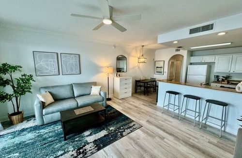 Florida Central Atlantic Coast Apartment | Balcony Lake Views | Pool, Gym, WiFi & Parking