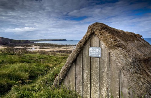 Angle House | Bangeston Farmhouse with Hot Tub, Log Fire, Beach Walks and Coast Path