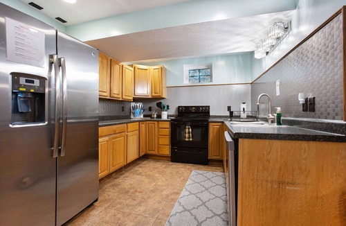 Byron Center House | Barn Swallow – Spacious, Private First Floor in a Historic Dairy Barn
