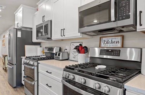 Cedar City House | Barndominium Blast | Sleeps 45, Barndominium, Sports Court, Hot Tub, Games & More!