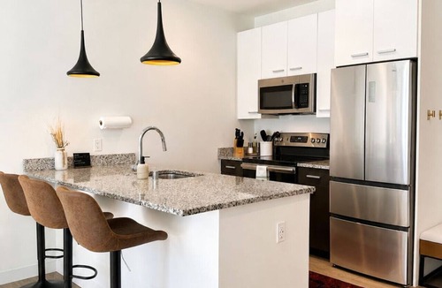 Bay View Apartment | Bay View Designer 1BR · Best Location with Balcony, Gym, and Terrace · Sleeps 4