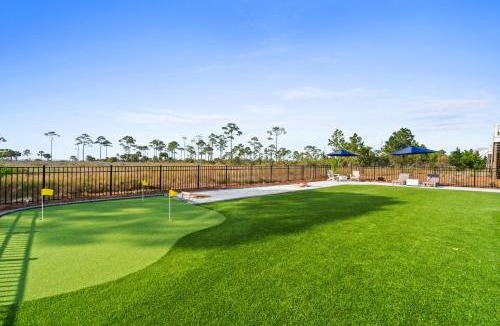 Port St. Joe House | Bayfront 4BR Home with Sunset Decks, Putting Green & Bonus Game Room
