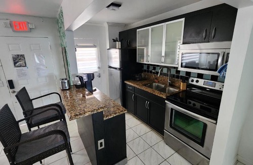 North Bay Village Apartment | Bayfront Apartment Breathtaking Views- one bedroom w balcony- living room -Free Parking