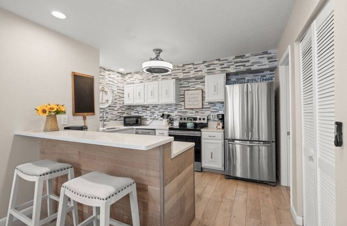 Siesta Key Condo | Bayfront Balconies in Tropical Siesta Key with Sunrise Views & Walkable Beach Access