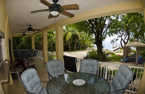 Rock Harbor House | Bayfront Beach House with Sandy Beach