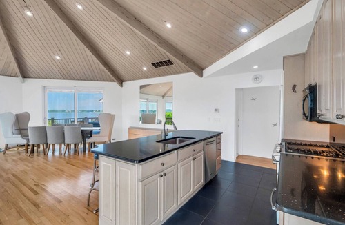 Westhampton Beach House | Bayfront home with private path across the street to ocean, pool and hot.
