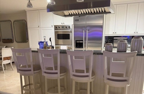 Tavernier House | Bayfront Serenity. 4 En-Suite Bedrooms. 1/2 bath. Elevator. Pool. Private Dock