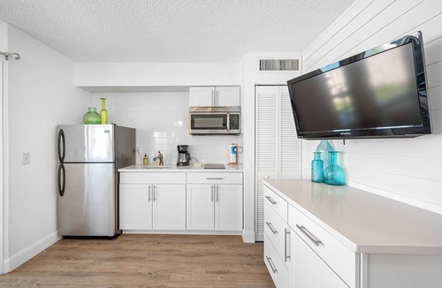 Belleair Beach Condo | 🍹BBC #212 - Step Into Gulf Coast Heaven! Heated Pool! Gulf Front!