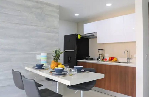Zona Hotelera Condo | Beach 2 min walk, rooftop pool+Tours & Car Rental