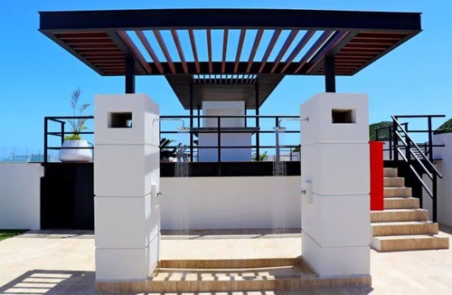 Zona Hotelera Condo | Beach 2 min walk, rooftop pool+Tours & Car Rental