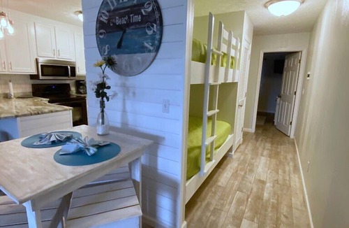 West Panama City Beach Condo | Beach access #73 across the street! Easy Parking!