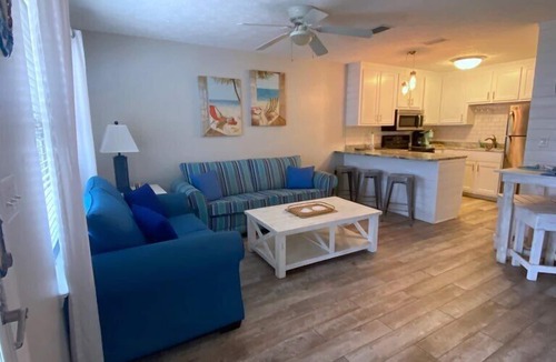 West Panama City Beach Condo | Beach access #73 across the street! Easy Parking!