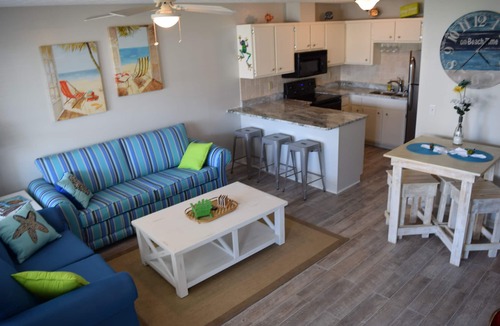 West Panama City Beach Condo | Beach access #73 across the street! Easy Parking!
