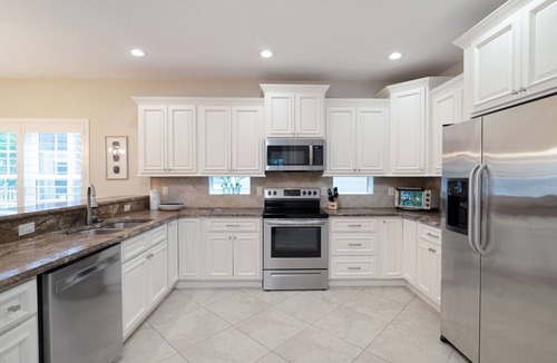 Holmes Beach House | Beach Breeze- 6 bedroom private pool/spa and one minute stroll to the beach
