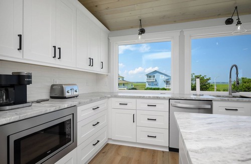 Caswell Beach House | Beach Buzz: Oceanfront with Expansive Beach and Sound Side Decks