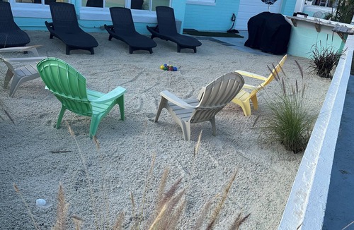 Sunny Shores House | Beach Family Retreat w/HOT TUB, Fire pit, Lots of games & only 100 Steps to Sand