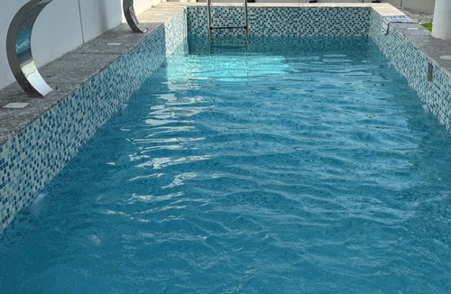 Al Hamriya Villa | Beach Front 4-bedroom villa with heated SPA pool