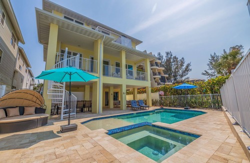 Indian Shores House | Beach Front Breeze Paradise – Gulf-Front Luxury w/Heated Pool, Hot Tub, Balconies & Sunset Views