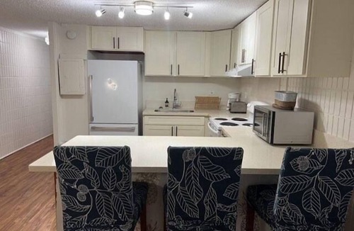 Punaluu Condo | Beach Front Condo w/Beautiful Sunrises on Private Sandy Beach with Calm & Gentle Waves