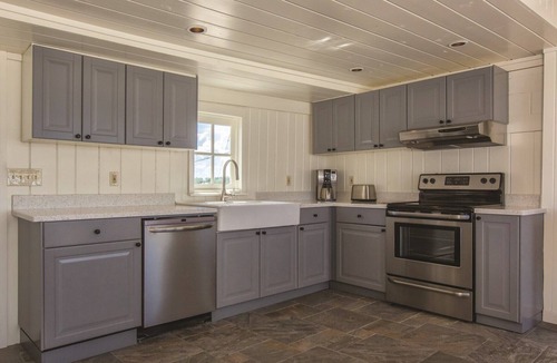 Fort Morgan House | Beach Front Cottage with Oversized Screened in Front Porch