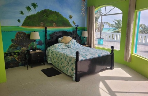 Boca Ciega Villa | Beach front in welcoming San Pedro w/AC, pool, fitness room, WiFi, kitchenette
