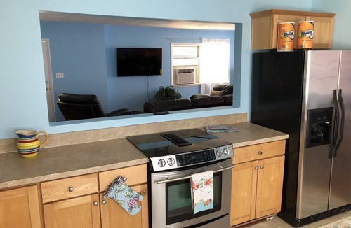 Cottage Line House | Beach Front on the Bay - Pet Friendly, Wi-Fi, Parking, Large Water front Deck
