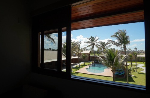 Caponga Apartment | Beach front One Bedroom with Pool and Garden Views