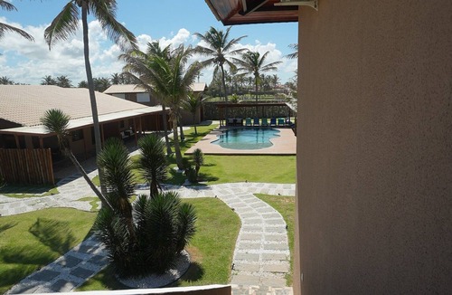 Caponga Apartment | Beach front One Bedroom with Pool and Garden Views
