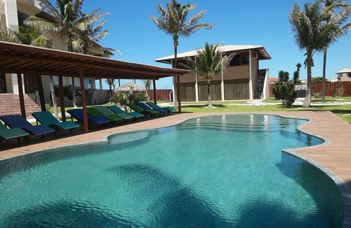 Caponga Apartment | Beach front One Bedroom with Pool and Garden Views