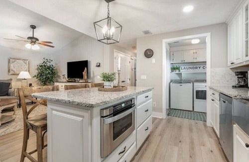 Garden City House | Beach House Captains Cove 3 BD, 2 BA, Linens & Golfcart included Lanai on Canal