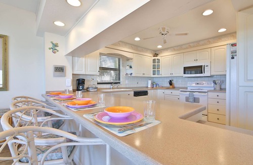 Holmes Beach Condo | Beach Oasis! Beachfront Condo with Unforgettable Sunsets, Heated Pool, WiFi