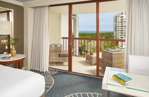Pelican Bay Resort | Beach Resort Stay Perfect for Romantic Getaways | Scenic Sunset at Your Room