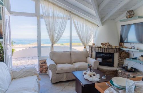 Almiros Beach Villa | Beach Villa Athanasia - villa with private pool on the beach by PosarelliVillas