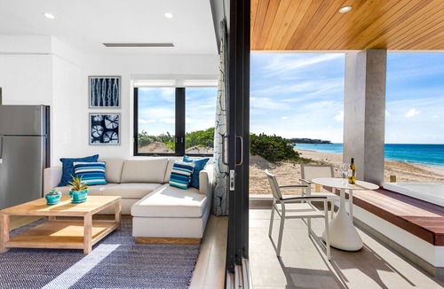 West End Village Condo | Beachfront 1-Bedroom + Hot Tub at Award-winning Tranquility Beach on Meads Bay
