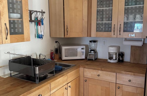 West End Apartment | Beachfront 1-bdr 1-bath "Sea Breeze Suite" 100 ft from the Ocean with a Pool!