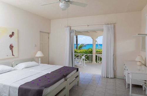 Silver Sands Apartment | Beachfront 2 bedrooms Apt. No. 3 right one the white sand beach of Silver Sands