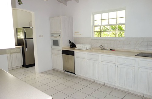 Silver Sands House | Beachfront 2 bedroom apt. No. 4 right one of the white sand beach of Silver Sands
