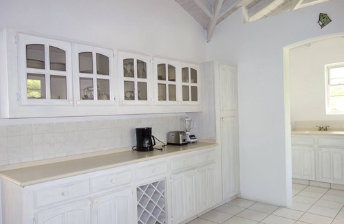 Silver Sands House | Beachfront 2 bedroom apt. No. 4 right one of the white sand beach of Silver Sands