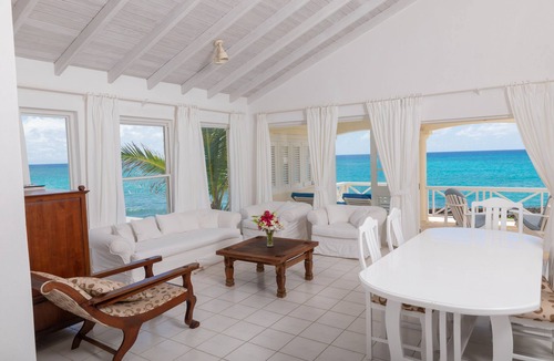 Silver Sands House | Beachfront 2 bedroom apt. No. 4 right one of the white sand beach of Silver Sands