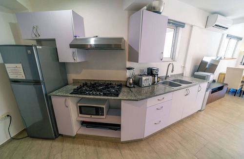 Cabarete Condo | Beachfront 2BR Ground Floor w/Patio 15 Steps to Sand Kite Beach