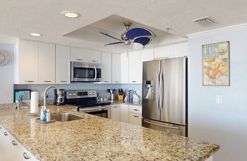 Madeira Beach Condo | Beachfront 2BR with Huge Private Balcony, Pool & Hot Tub & Incredible Madeira Beach Sunset.