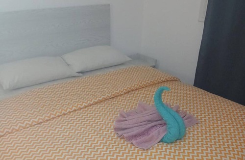 Village Road Apartment | Beachfront 3-Bed Sleeps 6 with Sea View