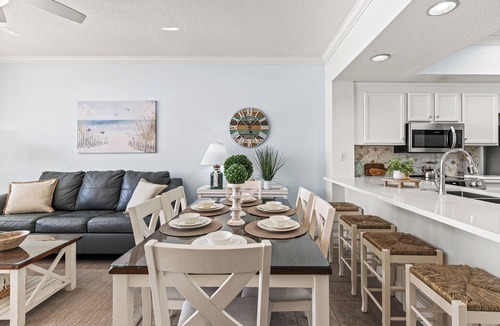 Fort Walton Beach Condo | Beachfront 3/2 condo with free beach service of 2 sets - park steps to the door.