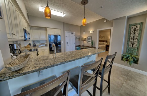 Thomas Drive Condo | Beachfront, all tiled unit. Beach chairs included Mar-Oct.