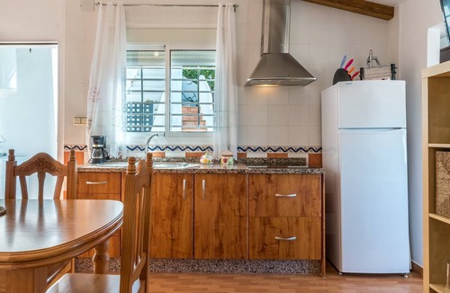 Benajarafe Apartment | Beachfront Apartment with Air Conditioning, Stunning Views, Terrace, and Wi-Fi