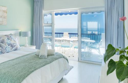 Shaka's Rock Apartment | Beachfront Apartments Shakas Rock - Santorini Estate, Pool, Ocean Views